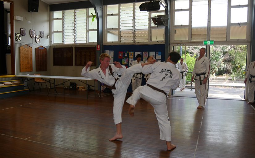 taekwondo students sparring